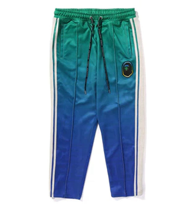 A BATHING APE LUX SPORT PATTERN JACQUARD TRACK PANTS A BATHING APE LUX SPORT PATTERN JACQUARD TRACK PANTS
