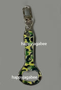 A BATHING APE ABC CAMO BOTTLE OPENER