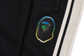A BATHING APE LUX SPORT PATTERN JACQUARD TRACK PANTS
