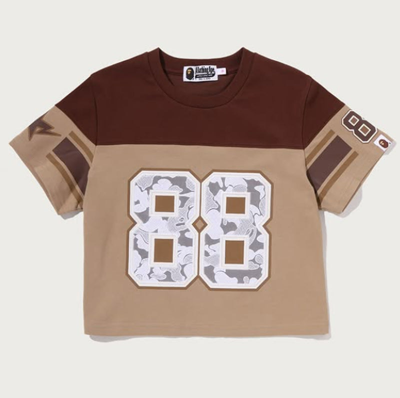 A BATHING APE Ladies' MULTI LOGO FOOTBALL BOXY CROPPED TEE