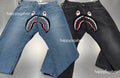A BATHING APE SHARK LOOSE FIT 13OZ DENIM PANTS