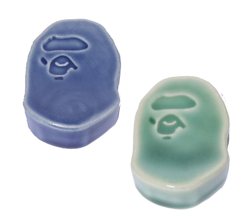A BATHING APE PORCELAIN APE HEAD CHOPSTICK REST