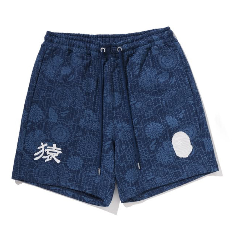 A BATHING APE JAPANESE INDIGO ART CAMO RELAXED FIT SWEAT SHORTS