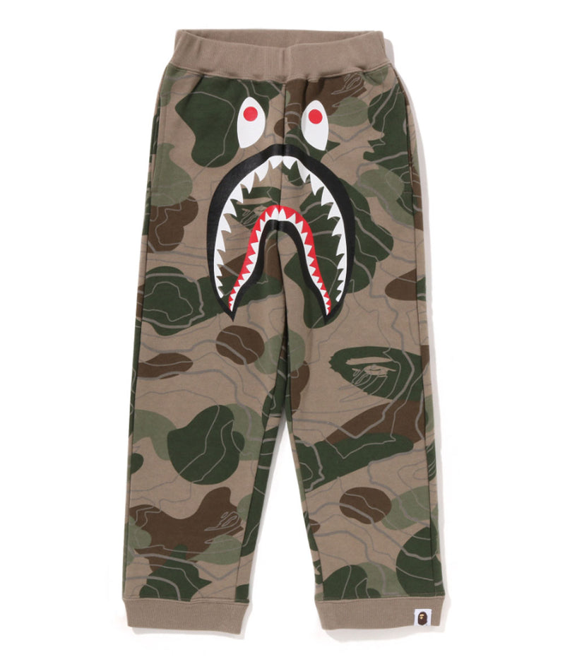 A BATHING APE BAPE KIDS LAYERED LINE CAMO SHARK SWEATPANTS GLOW IN THE DARK