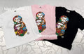 A BATHING APE BAPE KIDS MILO MULTI DINOSAURS PATTERN MILO ON APE HEAD TEE