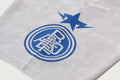 A BATHING APE APE FRAME PATTERN MULTI LOGO RELAXED FIT FOOTBALL JERSEY
