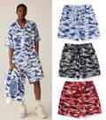 A BATHING APE PLAM TREE CAMO RELAXED FIT BEACH SHORTS