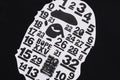 A BATHING APE 32ND ANNIV. BIG APE HEAD TEE