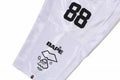 A BATHING APE SOLID CAMO MULTI LOGO RELAXED FIT FOOTBALL JERSEY