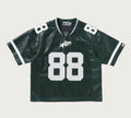 A BATHING APE PU LEATHER CROPPED FIT FOOTBALL JERSEY