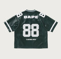 A BATHING APE PU LEATHER CROPPED FIT FOOTBALL JERSEY