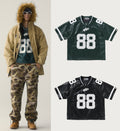 A BATHING APE PU LEATHER CROPPED FIT FOOTBALL JERSEY