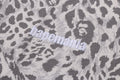 A BATHING APE WILD LEOPARD PATTERN RELAXED HALF ZIP SWEAT SHIRT