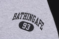 A BATHING APE COLLEGE RAGLAN TEE