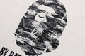 A BATHING APE PALM TREE CAMO BY BATHING APE RELAXED FIT TEE