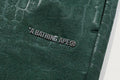 A BATHING APE CROC PATTERN LOGO RELAXED FIT SWEAT PANTS