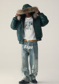A BATHING APE MULTI LOGO DENIM FLARED PANTS