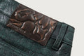 A BATHING APE CROC PATTERN LEATHER KNEE LENGTH PANTS