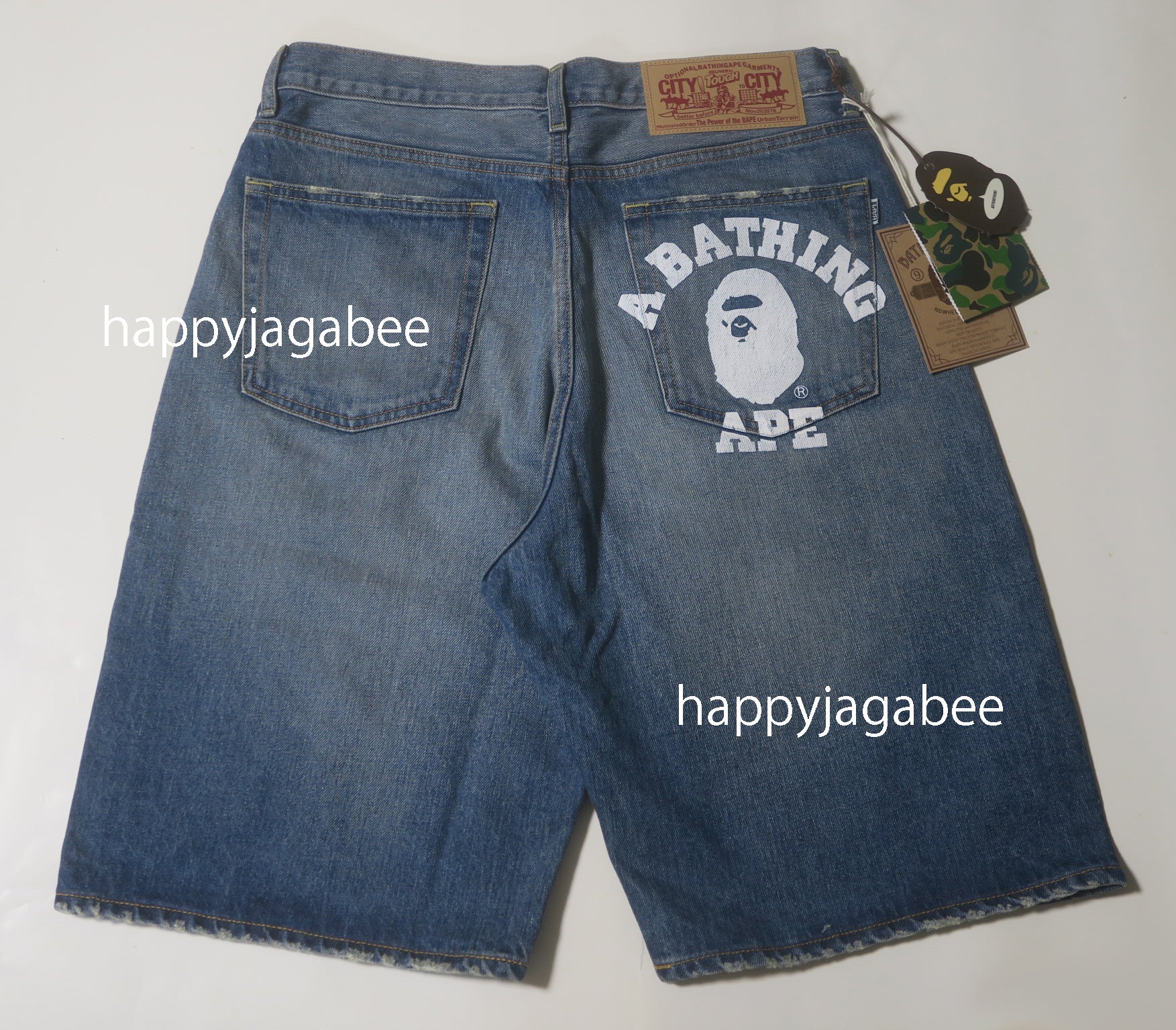 A BATHING APE COLLEGE RELAXED FIT 13OZ DENIM SHORTS