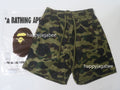 A BATHING APE 1ST CAMO BATHING APE LOGO SHORTS