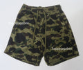 A BATHING APE 1ST CAMO BATHING APE LOGO SHORTS
