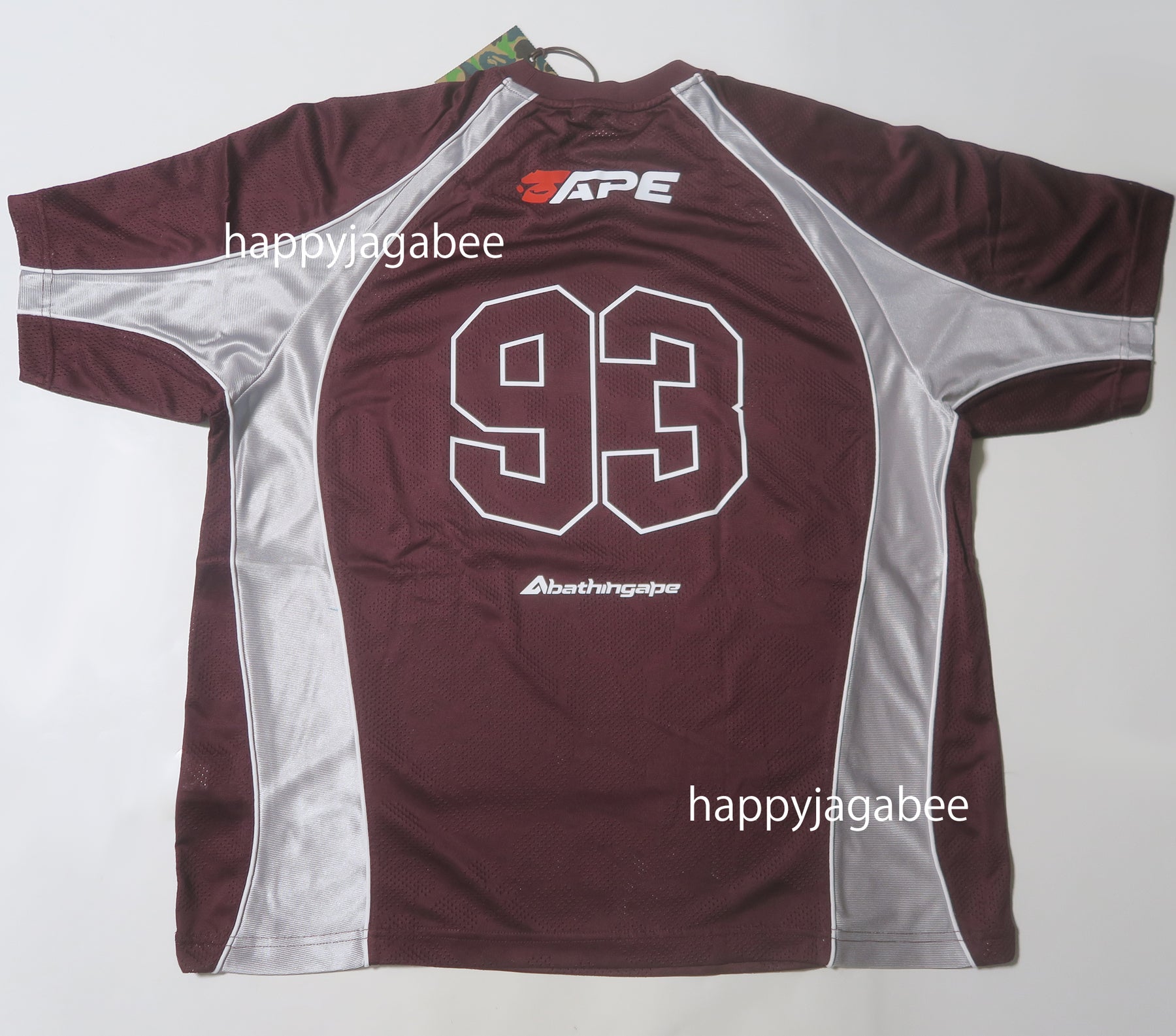 【A BATHING APE】SOLID CAMO JACQUARD FOOTBALL JERSEY A BATHING APE® Solid Camo Jacquard Multilogo Relaxed Fit