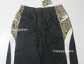 A BATHING APE WILD LEOPARD PATTERN OVERSIZED FIT TRACK PANTS