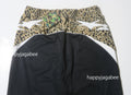 A BATHING APE WILD LEOPARD PATTERN OVERSIZED FIT TRACK PANTS