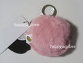 A BATHING APE - BABY MILO STORE BABY MILO PLUSH DOLL HEADPHONE HOLDER KEYCHAIN ( MINI POUCH KEYCHAIN )