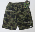 A BATHING APE BAPE KIDS 1ST CAMO ONE POINT BEACH SHORTS