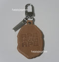 A BATHING APE APE HEAD LEATHER KEYCHAIN