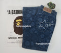 A BATHING APE JAPANESE INDIGO ART CAMO RELAXED FIT DENIM PANTS