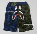 A BATHING APE BAPE KIDS SPLIT CAMO SHARK SWEAT SHORTS