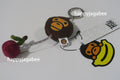 A BATHING APE BABY MILO STORE BABY MILO CHERRY PLUSH DOLL TAPE MEASURE KEYCHAIN