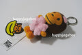 A BATHING APE BABY MILO STORE BABY MILO CHERRY BLOSSOM PLUSH DOLL KEYCHAIN