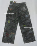 A BATHING APE HYBRID CAMO MULTI BADGE CARGO PANTS
