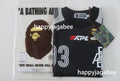 A BATHING APE APE FRAME PATTERN MULTI LOGO RELAXED FIT FOOTBALL JERSEY