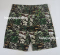 A BATHING APE CAMO PATCHWORK SHORTS