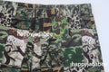 A BATHING APE CAMO PATCHWORK SHORTS