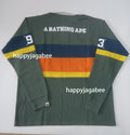 A BATHING APE BY BATHING APE STRIPED RUGBY SHIRT