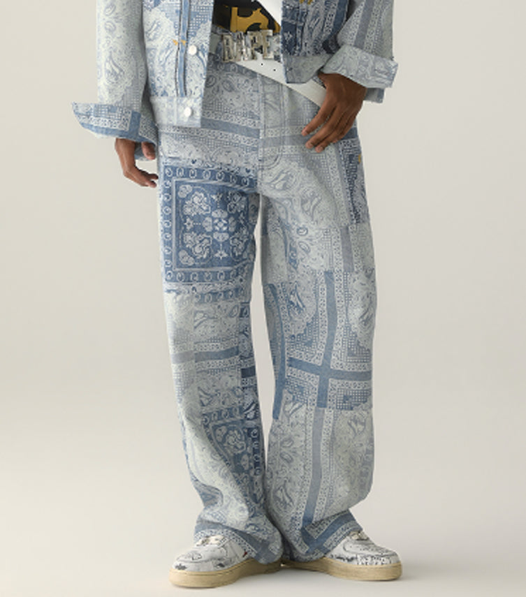 A BATHING APE PAISLEY PATTERN DENIM FLARED PANTS