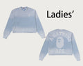A BATHING APE Ladies' INDIGO COLLEGE PRINT BOXY CROPPED LS TEE