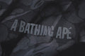 A BATHING APE OVERALL PRINT LOGO RELAXED FIT TEE