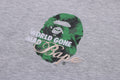 A BATHING APE FLORAL SOLID CAMO MEDIUM APE HEAD RELAXED FIT TEE