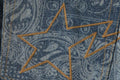 A BATHING APE PAISLEY PATTERN DENIM FLARED PANTS