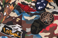 A BATHING APE HYBRID CAMO MULTI BADGE PADDED MA-1 JACKET