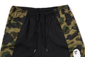 A BATHING APE 1ST CAMO RELAXED FIT TRACK PANTS