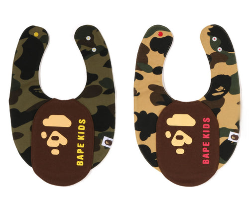 A BATHING APE BAPE KIDS 1ST CAMO APE HEAD MOTIF BIB