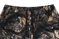 A BATHING APE TREE EDGE CAMO RELAXED FIT SWEAT PANTS