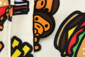 A BATHING APE BABY MILO STORE FAST FOOD ALL PRINT PATTERN MINI BACKPACK